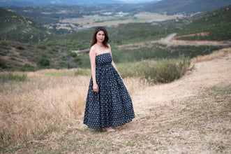 Midnight Tide: An off shoulder maxi dress