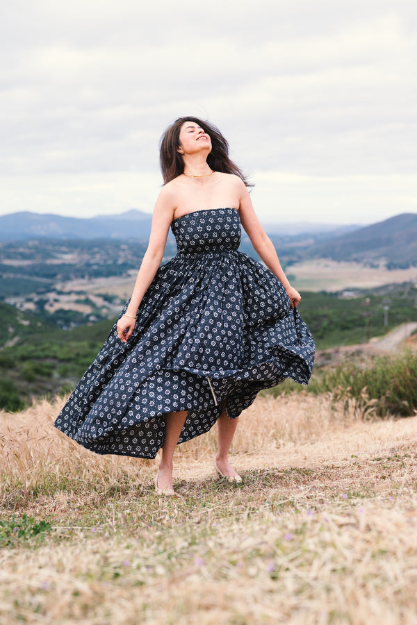 Midnight Tide: An off shoulder maxi dress