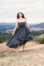 Midnight Tide: An off shoulder maxi dress