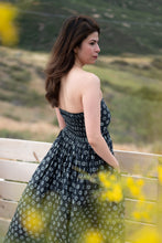 Midnight Tide: An off shoulder maxi dress